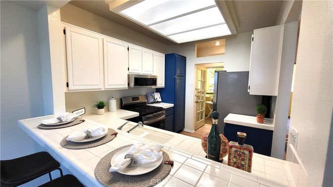 Interior, Kitchen, Recessed Lighting, Tile Countertops