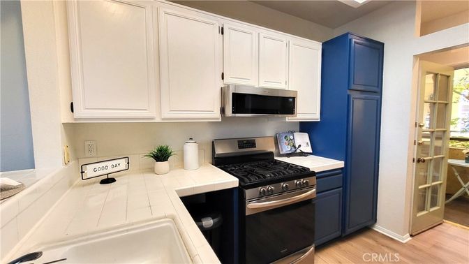 Interior, Kitchen, Tile Countertops, Wood Texture Flooring