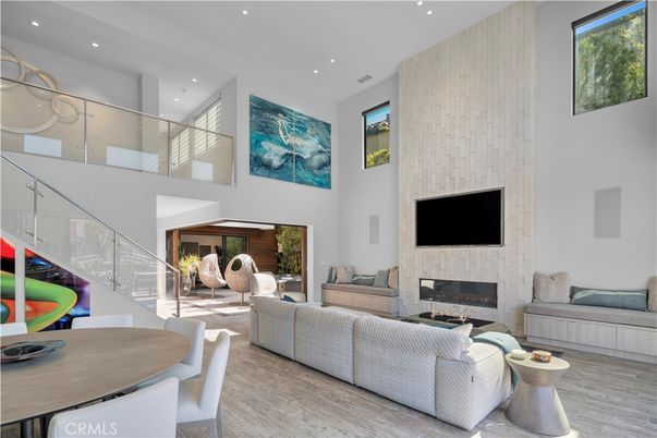 Dining room, Fireplace, Interior, Living room, Recessed Lighting, Wood Texture Flooring