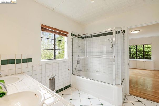 Bathroom, Glass Shower, Interior, Recessed Lighting, Tile Countertops, Wood Texture Flooring