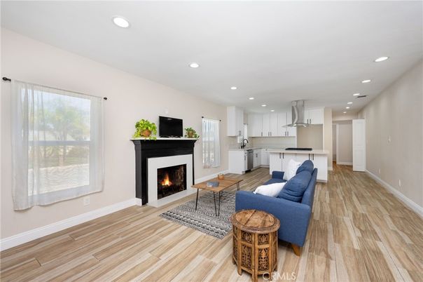 Fireplace, Interior, Kitchen, Living room, Recessed Lighting, Wood Texture Flooring