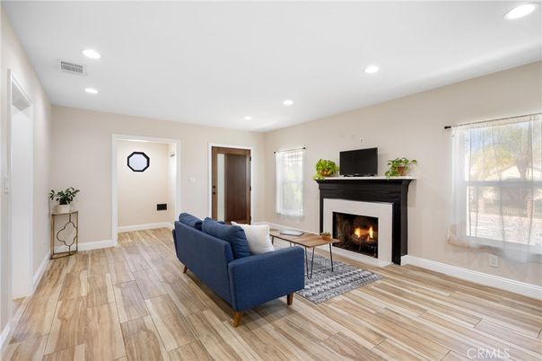 Fireplace, Interior, Living room, Recessed Lighting, Wood Texture Flooring