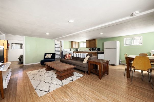 Dining room, Interior, Kitchen, Living room, Recessed Lighting, Stainless Steel Appliances, Wood Texture Flooring