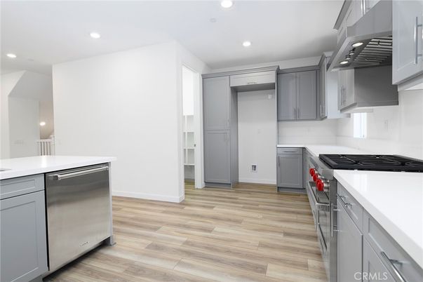 Interior, Kitchen, Recessed Lighting, Stainless Steel Appliances, Wood Texture Flooring