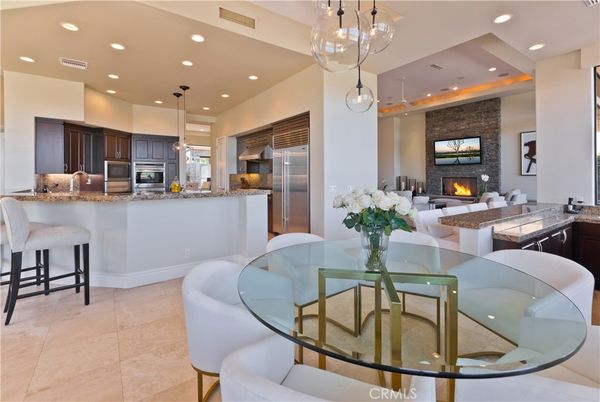 Dining room, Fireplace, Interior, Kitchen, Living room, Pendant Lights, Recessed Lighting, Stainless Steel Appliances, Stone Walls