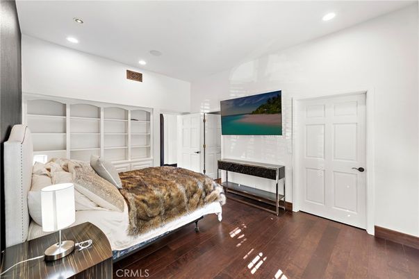 Bedroom, Fireplace, Interior, Recessed Lighting, Wood Texture Flooring
