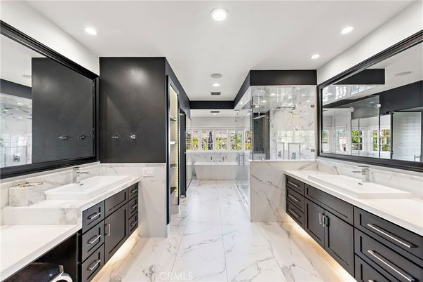 Bathroom, Dual Sink Vanities, Free Standing Baths, Glass Shower, Interior, Marble, Marble Walls, Recessed Lighting