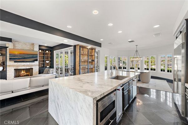 Fireplace, Interior, Kitchen, Living room, Pendant Lights, Recessed Lighting, Stainless Steel Appliances