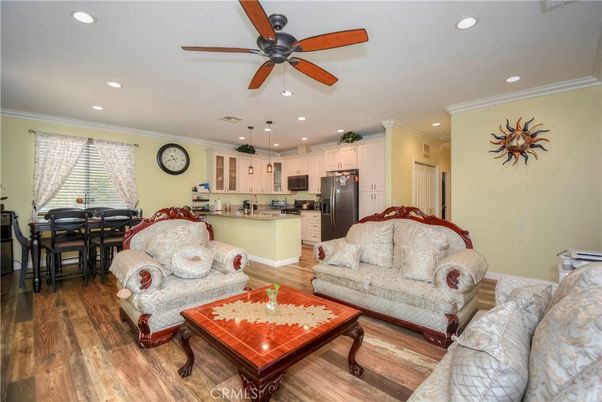 Dining room, Interior, Kitchen, Living room, Pendant Lights, Recessed Lighting, Stainless Steel Appliances, Wood Texture Flooring