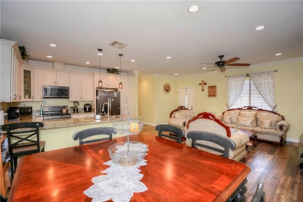 Dining room, Interior, Kitchen, Living room, Pendant Lights, Recessed Lighting, Stainless Steel Appliances, Wood Texture Flooring