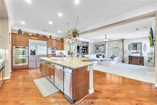 Fireplace, Interior, Kitchen, Living room, Recessed Lighting, Stainless Steel Appliances, Wood Texture Flooring
