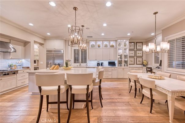 Chandelier, Dining room, Interior, Kitchen, Pendant Lights, Recessed Lighting, Stainless Steel Appliances, Wood Texture Flooring