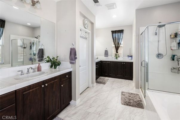 Bathroom, Dual Sink Vanities, Glass Shower, Interior, Marble, Recessed Lighting