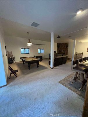 Billiard Table, Fireplace, Game Room, Interior, Pendant Lights, Piano, Stone Walls