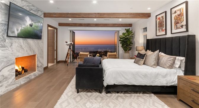 Bedroom, Fireplace, Interior, Marble Walls, Recessed Lighting, Water, Wooden Beams, Wood Texture Flooring