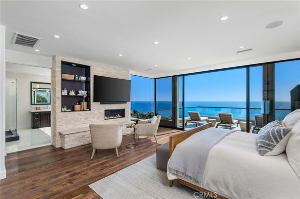 Bedroom, Fireplace, Interior, Living room, Recessed Lighting, Water, Wood Texture Flooring