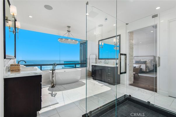 Bathroom, Bedroom, Dual Sink Vanities, Free Standing Baths, Glass Shower, Interior, Marble, Pendant Lights, Recessed Lighting, Water, Wood Texture Flooring