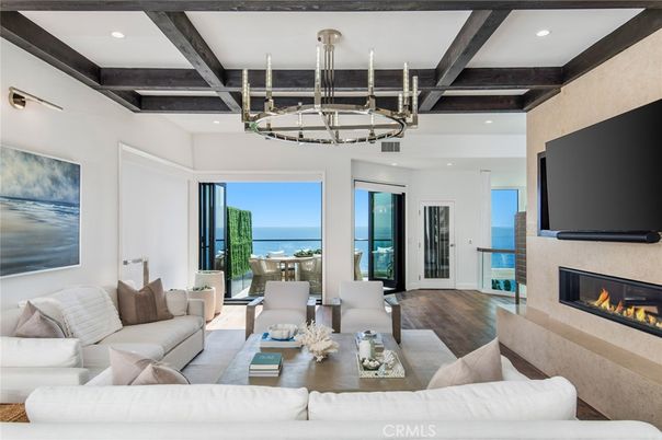 Chandelier, Fireplace, Interior, Living room, Recessed Lighting, Water, Wooden Beams, Wood Texture Flooring