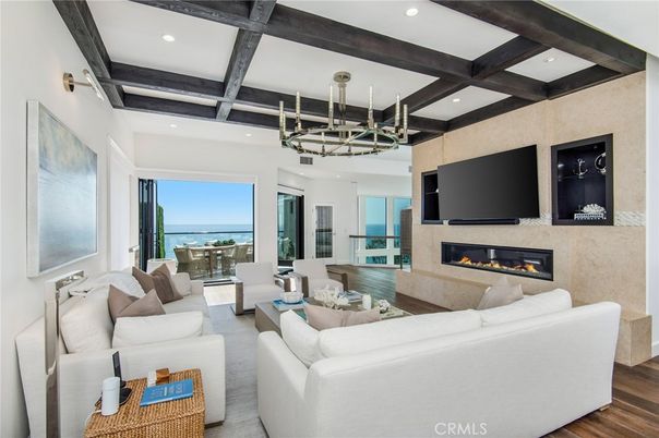 Chandelier, Fireplace, Interior, Living room, Recessed Lighting, Water, Wooden Beams, Wood Texture Flooring