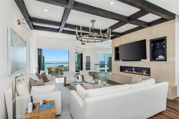 Chandelier, Fireplace, Interior, Living room, Recessed Lighting, Water, Wooden Beams, Wood Texture Flooring