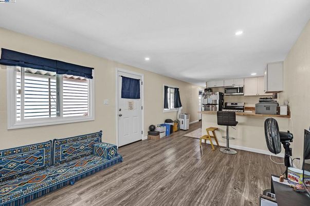 Interior, Kitchen, Recessed Lighting, Stainless Steel Appliances, Wood Texture Flooring