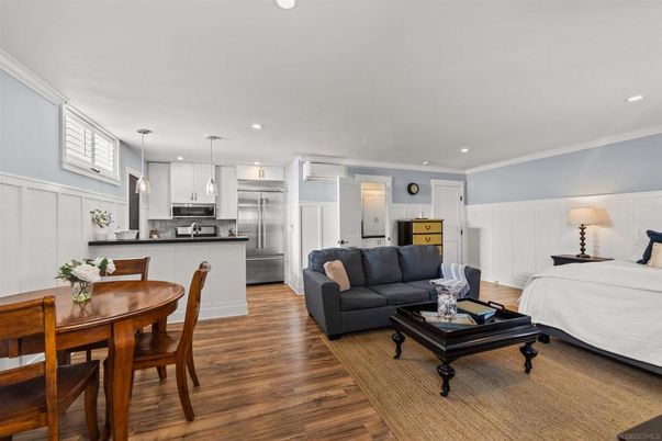 Dining room, Interior, Kitchen, Living room, Pendant Lights, Recessed Lighting, Stainless Steel Appliances, Wood Texture Flooring