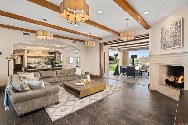 Chandelier, Dining room, Fireplace, Interior, Kitchen, Living room, Pendant Lights, Recessed Lighting, Wooden Beams, Wood Texture Flooring