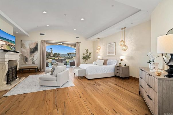 Bedroom, Fireplace, Interior, Living room, Pendant Lights, Recessed Lighting, Wood Texture Flooring