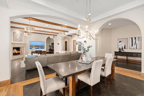 Chandelier, Dining room, Fireplace, Interior, Living room, Pendant Lights, Recessed Lighting, Wooden Beams