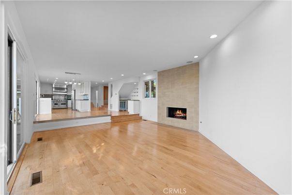 Empty room, Fireplace, Interior, Kitchen, Pendant Lights, Recessed Lighting, Wood Texture Flooring