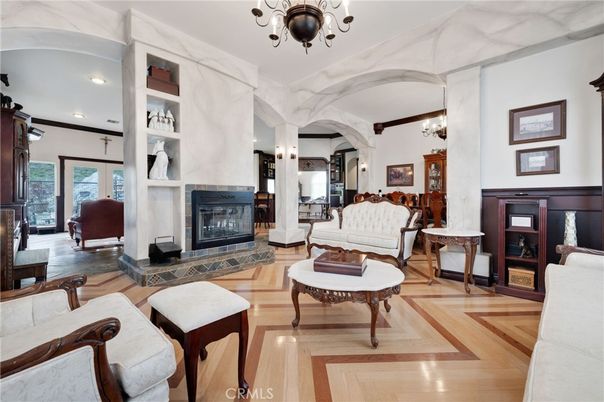 Chandelier, Fireplace, Interior, Living room, Recessed Lighting, Wood Texture Flooring