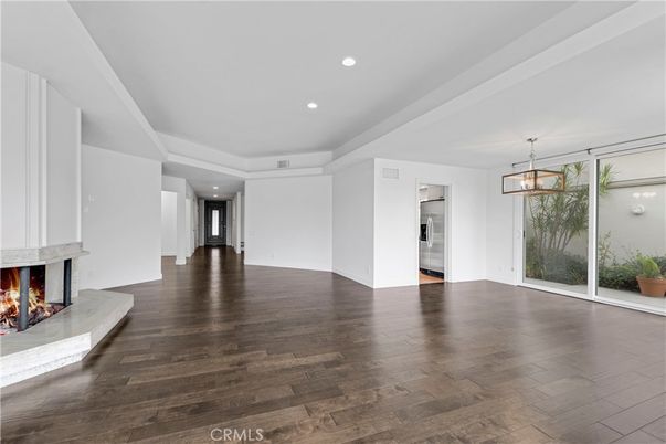 Empty room, Fireplace, Interior, Pendant Lights, Recessed Lighting, Wood Texture Flooring