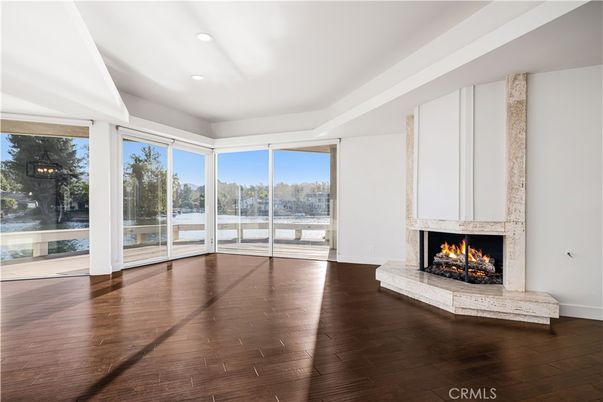 Empty room, Fireplace, Interior, Recessed Lighting, Wood Texture Flooring