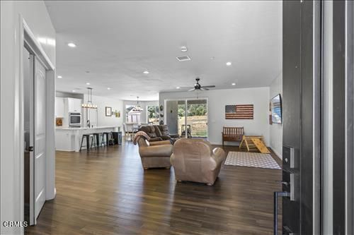 Chandelier, Dining room, Interior, Kitchen, Living room, Pendant Lights, Recessed Lighting, Wood Texture Flooring