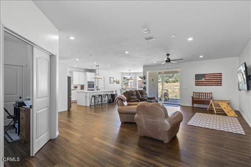 Chandelier, Dining room, Interior, Kitchen, Living room, Pendant Lights, Recessed Lighting, Wood Texture Flooring