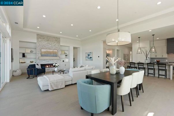 Dining room, Fireplace, Interior, Kitchen, Living room, Pendant Lights, Recessed Lighting, Stone Walls, Wood Texture Flooring