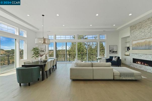 Dining room, Fireplace, Interior, Living room, Pendant Lights, Recessed Lighting, Stone Walls, Wood Texture Flooring