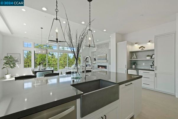 Fireplace, Interior, Kitchen, Pendant Lights, Recessed Lighting, Stainless Steel Appliances