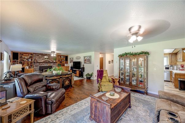 Dining room, Fireplace, Interior, Kitchen, Living room, Stone Walls, Wood Texture Flooring