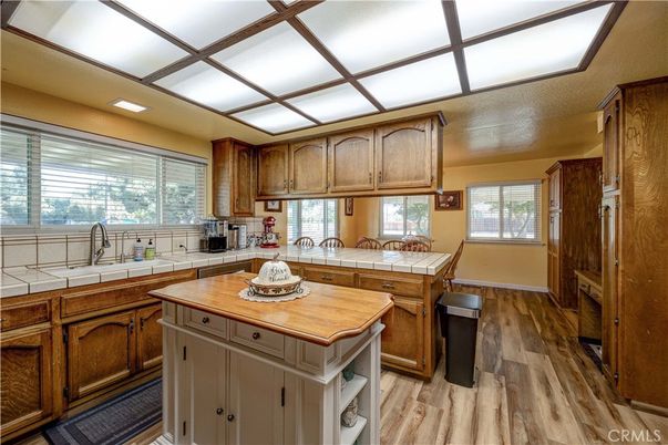 Interior, Kitchen, Tile Countertops, Wood Texture Flooring