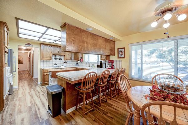 Dining room, Interior, Kitchen, Tile Countertops, Wood Texture Flooring