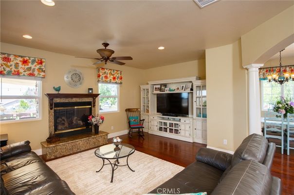 Dining room, Fireplace, Interior, Living room, Recessed Lighting, Wood Texture Flooring