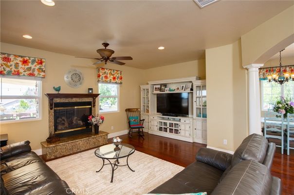 Dining room, Fireplace, Interior, Living room, Recessed Lighting, Wood Texture Flooring