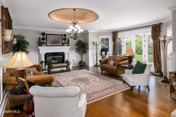 Chandelier, Fireplace, Interior, Living room, Recessed Lighting, Wood Texture Flooring