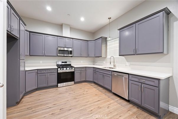 Interior, Kitchen, Pendant Lights, Recessed Lighting, Stainless Steel Appliances, Wood Texture Flooring