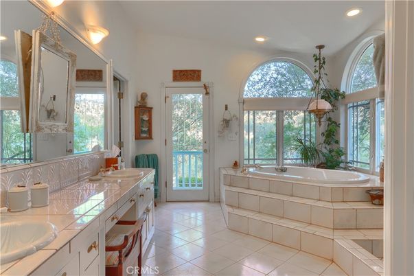 Bathroom, Dual Sink Vanities, Interior, Recessed Lighting, Tile Countertops