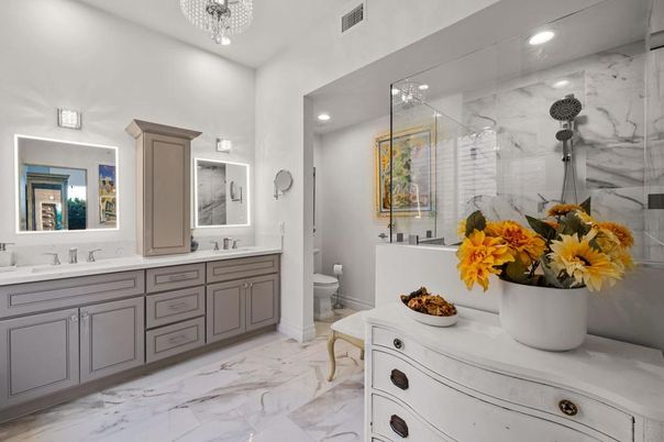 Bathroom, Dual Sink Vanities, Glass Shower, Interior, Marble, Marble Walls, Recessed Lighting
