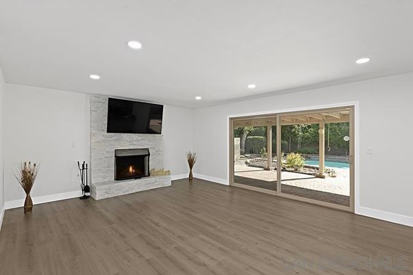 Empty room, Fireplace, Interior, Recessed Lighting, Wood Texture Flooring