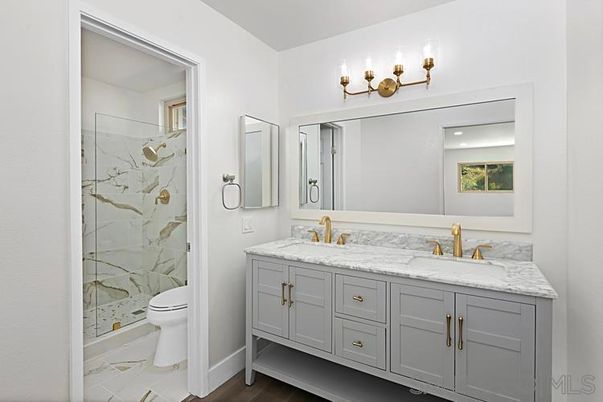 Bathroom, Dual Sink Vanities, Glass Shower, Interior, Marble, Marble Walls, Wood Texture Flooring