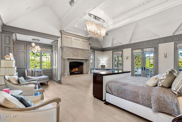 Bedroom, Chandelier, Fireplace, Interior, Recessed Lighting, Wood Texture Flooring